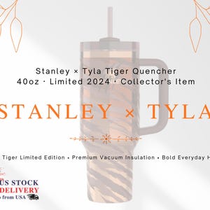 May include: A Stanley x Tyla Tiger Quencher tumbler with a tiger stripe design. The 40oz insulated tumbler has a handle and a straw. Text on the tumbler reads "STANLEY x TYLA". The image also includes the text "Limited 2024" and "Collector's Item".