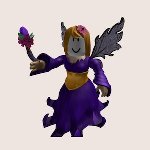 May include: A digital avatar of a fairy with a blank face and a smiling mouth. The fairy wears a purple dress with a gold belt, black wings, and a flower in her hair. She holds a wand with a purple gem and flowers.