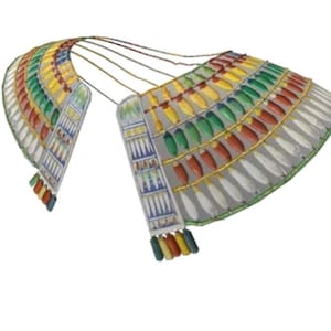 May include: A colorful, multi-layered, beaded collar with a decorative design. The collar is made of white, red, green, yellow, and blue beads. The collar is a traditional Egyptian style.