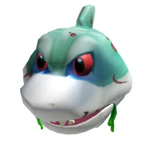 May include: A cartoon shark head with a teal and white color scheme. The shark has red eyes, a wide open mouth with visible teeth, and green slime dripping from its mouth. The shark's head has a fin on top.
