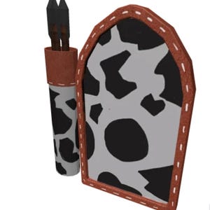 Könnte beinhalten: Ein Spielzeugset mit Schild und Köcher mit Pfeilen. Der Schild hat einen grauen Hintergrund mit schwarzen Flecken, einen braunen Rand und weiße Nähte. Köcher und Schild haben ein passendes Kuhmuster. Die Pfeile haben schwarze Spitzen.
