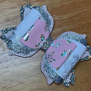 Butterfly pink and silver glitter tumbler bow.  Fits popular tumbler brands
