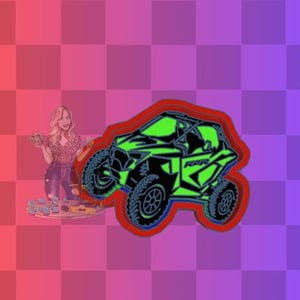 May include: A green and black off-road vehicle with a red outline. The vehicle has four wheels and a roll cage. The vehicle is a side view.
