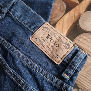 Vintage Polo jeans by Ralph Lauren denim jeans small size 28&quot; waist 34&quot; hip  9.5&quot; rise  29.5 inseam heavy weight dark denim fabric  boot cut