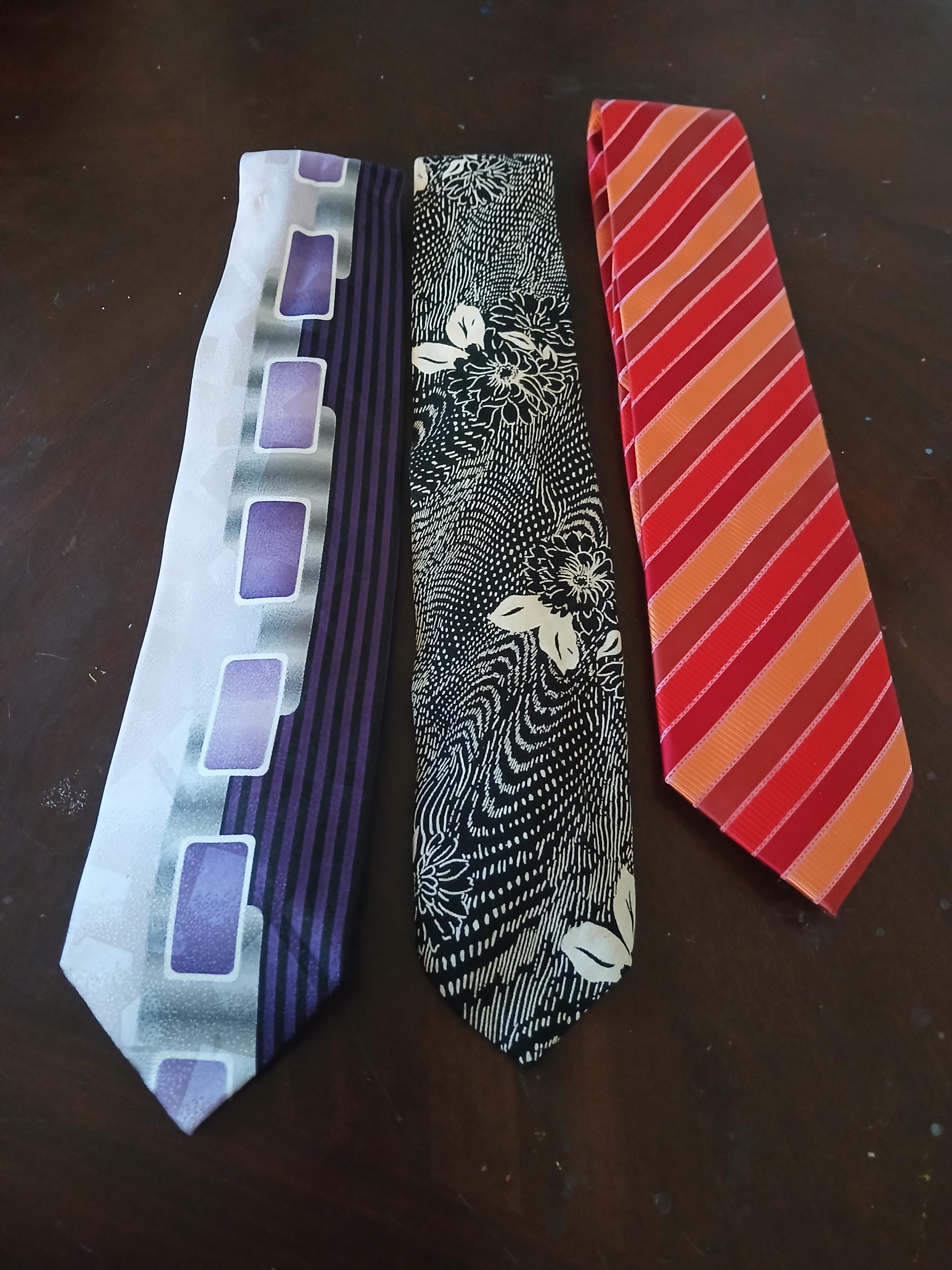 navy blue tux with coral tie