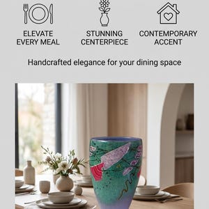 May include: A glass vase with a tapered shape, featuring a gradient of purple at the base transitioning to a speckled teal green. The surface displays abstract pink and white painted shapes. Text reads: ARTISAN MODERN DECOR, ELEVATE EVERY MEAL, STUNNING CENTERPIECE, CONTEMPORARY ACCENT, Handcrafted elegance for your dining space.