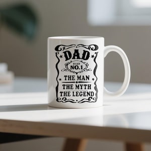 Pode incluir: Caneca de cer&acirc;mica branca com um design preto que diz "Dad Best No.1 The Man The Myth The Legend".
