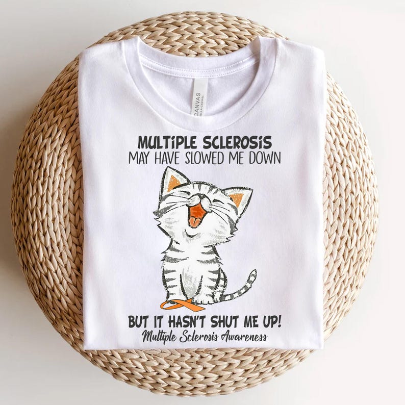 a white t - shirt with a picture of a cat saying multiple scleross