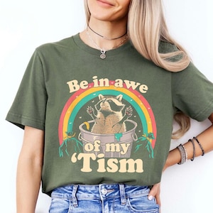 Be in Awe of My &#39;Tism T-Shirt - Funny Raccoon Shirt - Autism Awareness Tee - Quirky Rainbow Design - Neurodivergent Pride Shirt