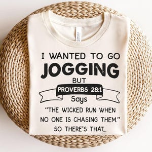 Hilarious Proverbs 28:1 Jogging Shirt – Funny Christian Fitness Tee – Bible Verse Humor for Non-Runners