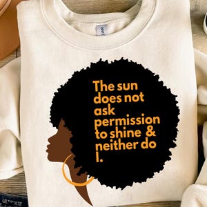 a t - shirt with the words the sun does not ask permission to shine and