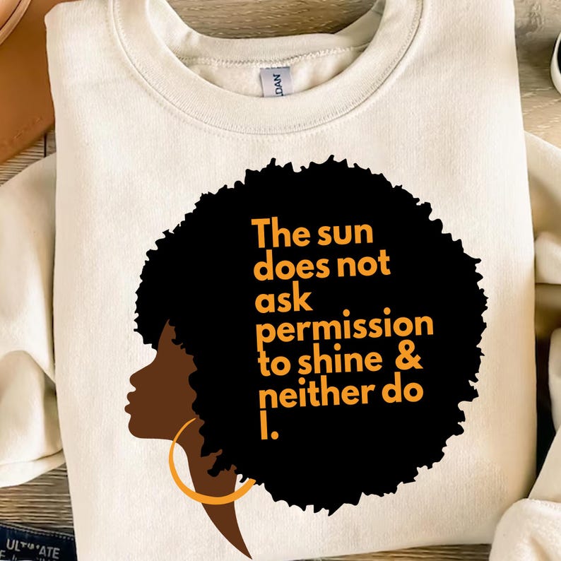 a t - shirt with the words the sun does not ask permission to shine and
