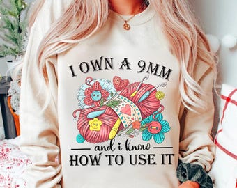 Funny Crochet Shirt - I Own a 9mm and I Know How to Use It - Yarn Lover Gift - Crochet Humor Sweatshirt for Crafters and Knitters
