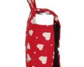 red inhaler holder with white hearts