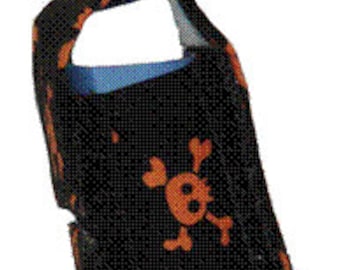 black inhaler holder with orange skill and cross bones