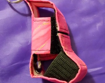 pink fabric with gold design inhaler case