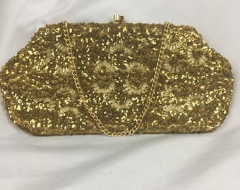 Embrague con cuentas de oro de 1960