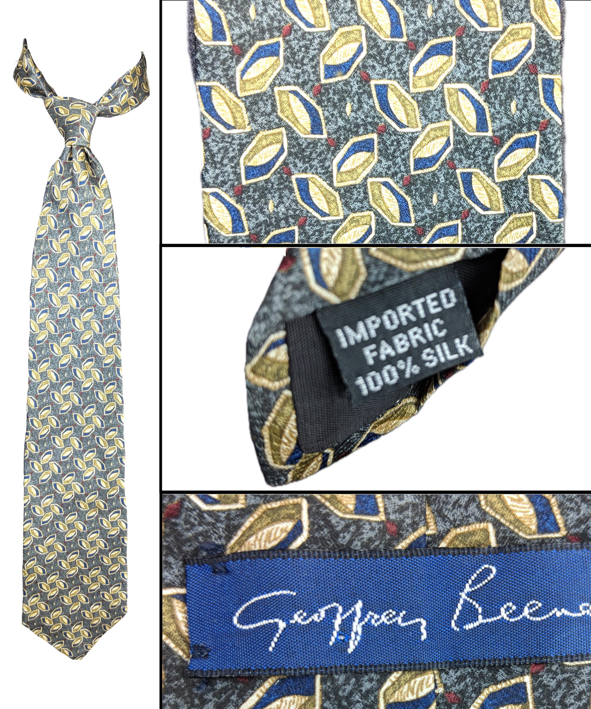 Cravatta in seta Geoffrey Beene: elegante cravatta a righe - Italia Cravatta in seta Geoffrey Beene: elegante cravatta a righe - Italia