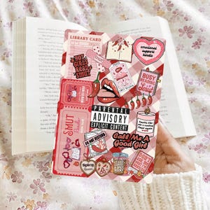 May include: A collection of stickers with a red and white checkered background. The stickers feature text like "Hot Girls Read Smut", "Parental Advisory Explicit Content", and "Busy Reading Smut". Other stickers include chili peppers, lips, and a candle.