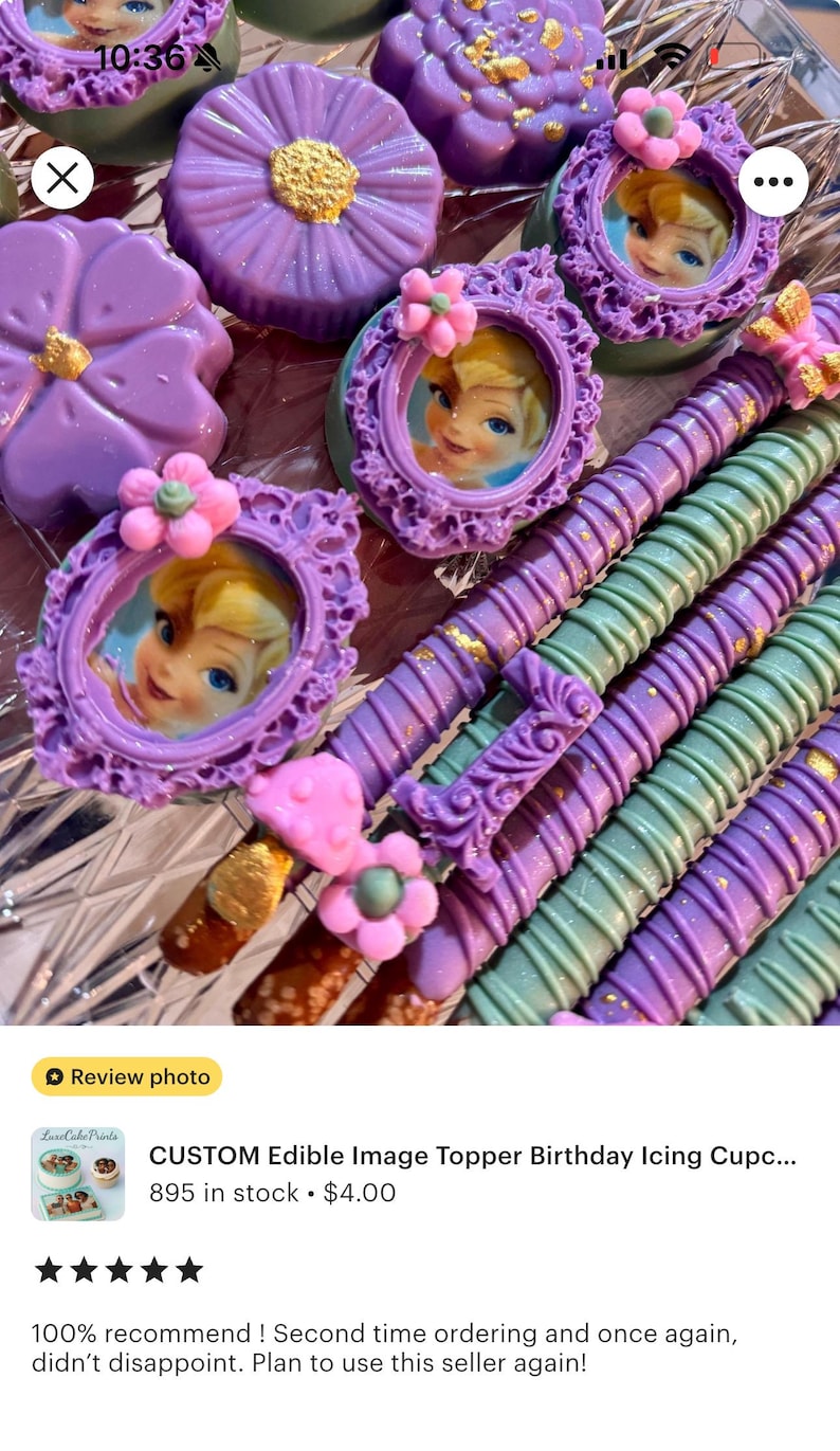 May include: An assortment of custom edible image toppers and decorated pretzel rods. The toppers are purple with a flower design and a framed image of a cartoon character. The pretzel rods are purple and green with gold accents and pink flower decorations.