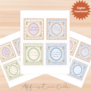 May include: A set of affirmation cards with watercolor-style designs. Each card features a positive affirmation in a decorative frame. The cards are printed on white paper and include phrases like "I am kind and honest" and "I am proud of myself."