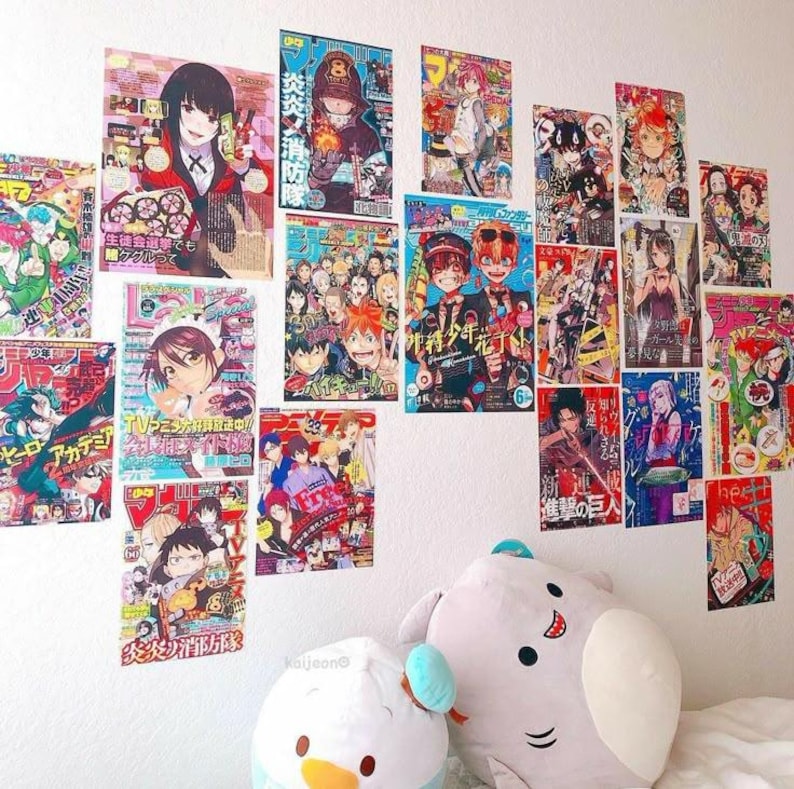 May include: A wall decorated with colorful anime manga magazine covers featuring characters from popular series like "My Hero Academia", "Fire Force", and "Jujutsu Kaisen".