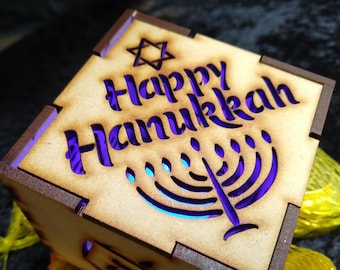 Happy Hanukkah 3-inch laser cut cube kit featuring Star of David, Menorah, Dreidel, and Present Cutout Designs