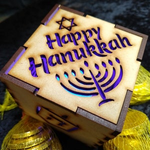 Happy Hanukkah 3-inch laser cut cube kit featuring Star of David, Menorah, Dreidel, and Present Cutout Designs image 1