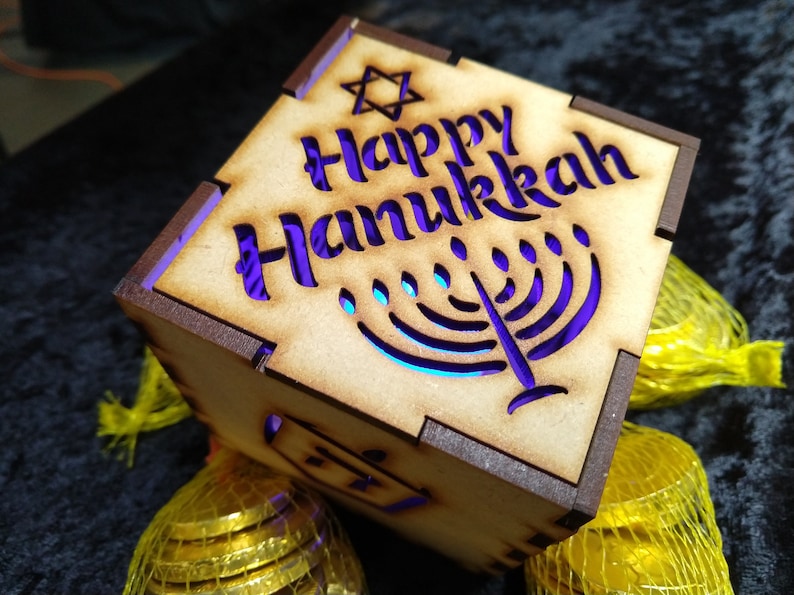 Happy Hanukkah 3-inch laser cut cube kit featuring Star of David, Menorah, Dreidel, and Present Cutout Designs image 1