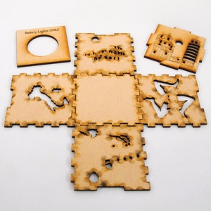 Happy Hanukkah 3-inch laser cut cube kit featuring Star of David, Menorah, Dreidel, and Present Cutout Designs image 2