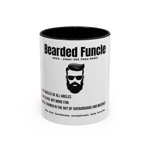 May include: A white ceramic mug with a black interior features the text "Bearded Funcle" and a graphic of a bearded man wearing sunglasses. Additional text describes the "Funcle" as the coolest of all uncles.