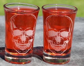 Skull shot or dessert glasses sets of 8, 6, 4 or 2 on clear or black glass