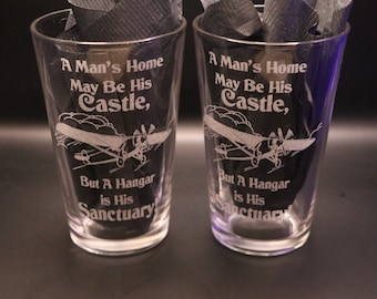 Pilot A Man's home may be his castle, but a hanger is his sanctuary.  Etched Pub, Wine or Rocks Glasses Set Of 2