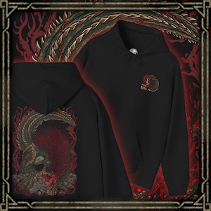 May include: Black hoodie featuring a detailed illustration of a dragon with red and green accents. The back of the hoodie displays a large dragon design, while the front has a smaller emblem. The design has a fantasy theme.
