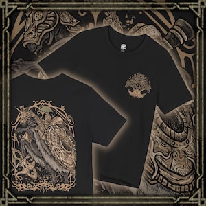 May include: Black t-shirts with detailed gold and tan illustrations. One shirt features a tree of life design on the chest. The other shirt displays a knight on a horse with a shield. The shirts are displayed on a decorative background.