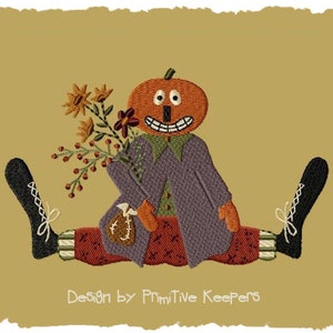 May include: A whimsical pumpkin-headed figure with a toothy grin, wearing a purple coat and red pants, sits with legs outstretched. The figure holds a small brown bag and a bouquet of fall-colored flowers.