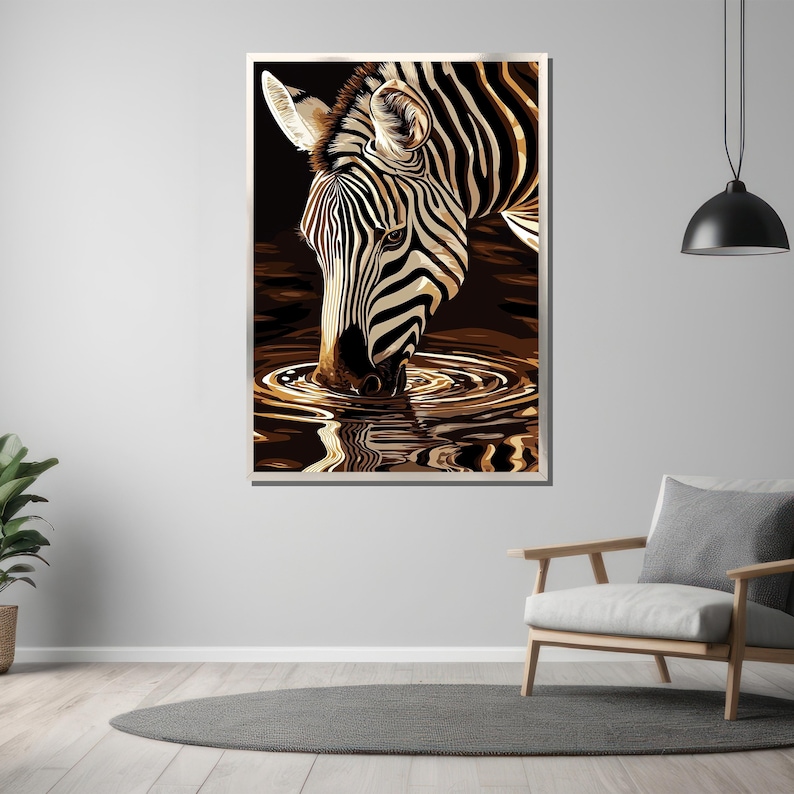 May include: A black and white zebra with black stripes drinks from a pool of water. The zebra's head is bent down to drink, and the water is rippling around its mouth.