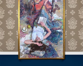 May include: An oil painting in a gold frame depicts a person reclining on pillows, reading a book. The artwork features a palette of blues, greens, reds, and browns. A teacup and apple are on the floor. The painting is set against a patterned wallpaper.