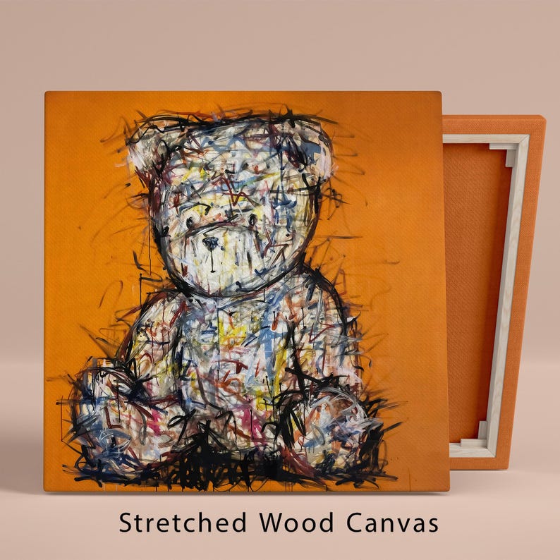 May include: A colourful abstract painting of a teddy bear sitting on a bright orange background. The bear is drawn with thick black lines and filled with a variety of colours, including blue, green, yellow, and red. The painting is on a stretched wood canvas.