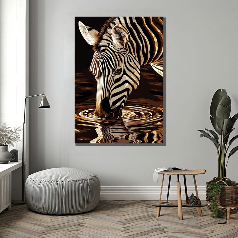 May include: A black and white zebra with black stripes drinks from a pool of water. The zebra's reflection is visible in the water.