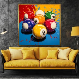 May include: A colourful abstract painting of eight billiard balls on a blue background with red, yellow and white paint splatters. The balls are arranged in a cluster, with the number eight ball in the centre.