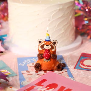 Cute Whimsical Red Panda Strawberry Cake Topper Blue Hat Ceramic Birthday Figurine Adorable Party Decor Handmade Baby Shower Ornament