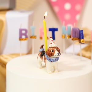 May include: A set of three ceramic mugs with a speckled, matte finish. The mugs are in shades of cream, light gray, and dark gray. Each mug has a simple, minimalist design, perfect for coffee or tea.