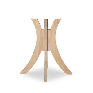 May include: A wooden table base with a curved, X-shaped design. The base is made of light-colored wood and has a smooth finish.