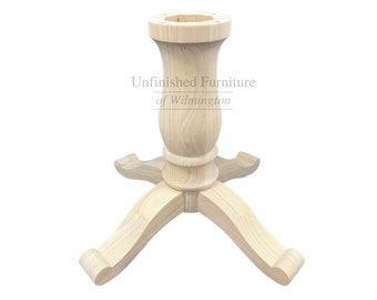 May include: Unfinished wood table base with a turned pedestal and four curved legs. The base is designed for a round table top.