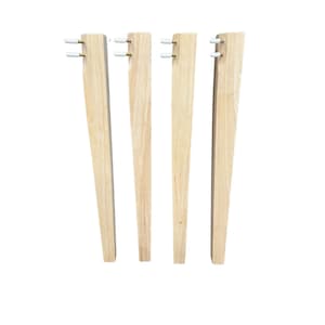 May include: Four wooden table legs with white plastic caps on the ends. The legs are unfinished and have a natural wood color.