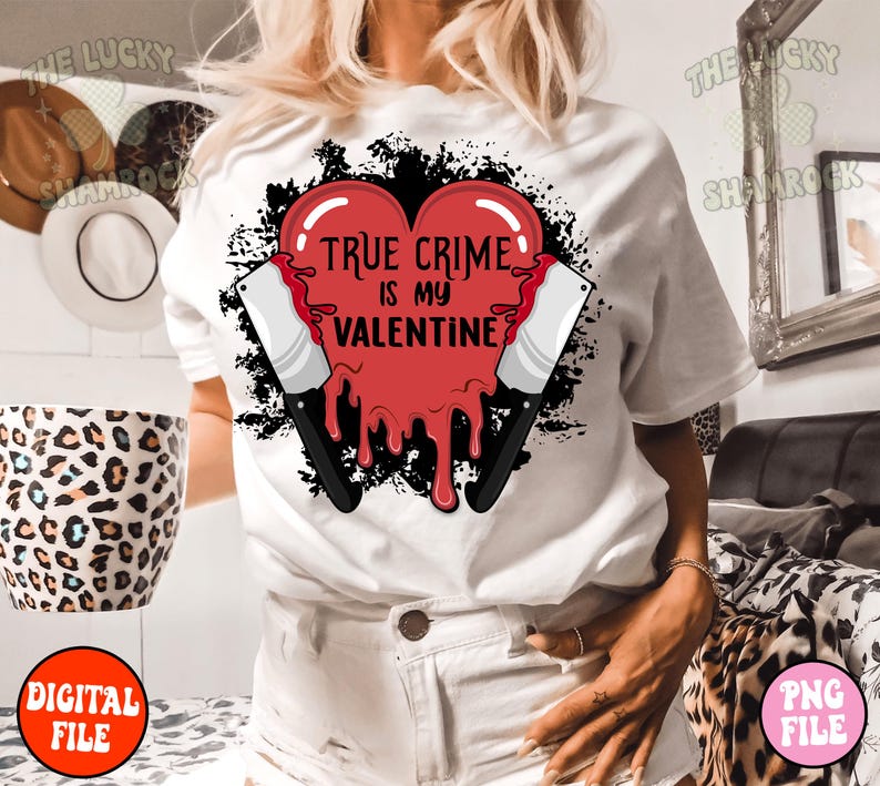 May include: White t-shirt with a red dripping heart that says "True Crime is my Valentine" with two black knives on either side of the heart.