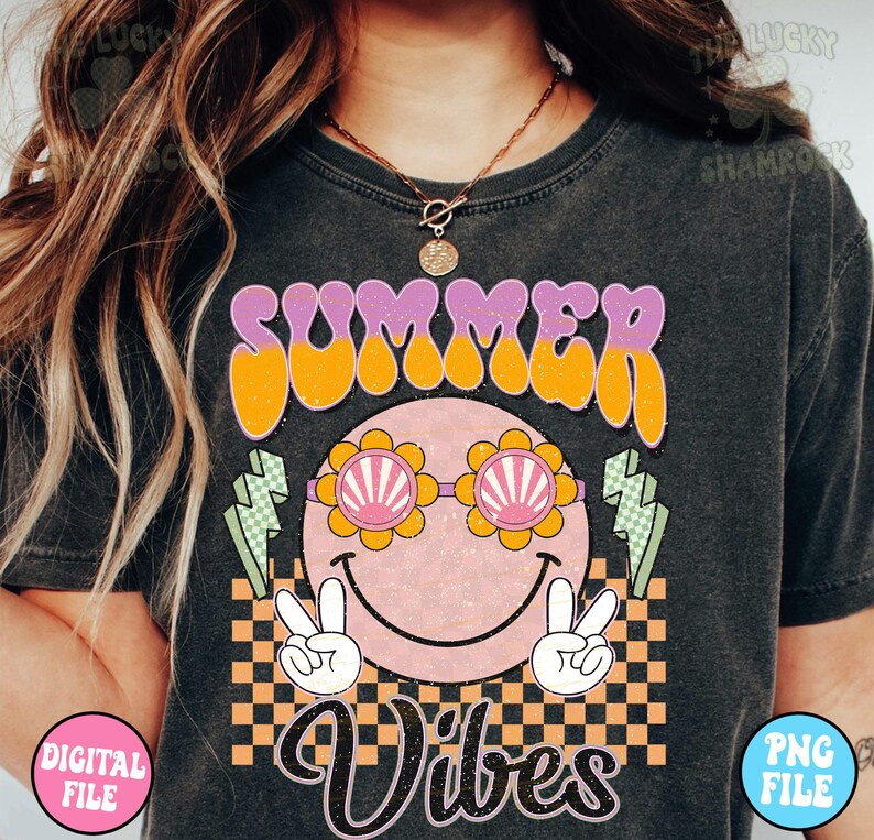 May include: A black t-shirt with a graphic design featuring a smiling face with sunglasses, peace signs, and the text "Summer Vibes" in a retro font.