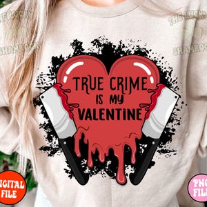 May include: A red heart with dripping blood and two butcher knives, with the text "True Crime is my Valentine" on the heart.