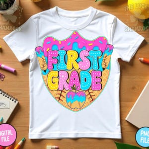 May include: White t-shirt featuring a colorful graphic design for first grade. The design includes the words "FIRST GRADE" in bubble letters, a donut, a baseball, and pencils. The shirt is made of a soft, comfortable material.